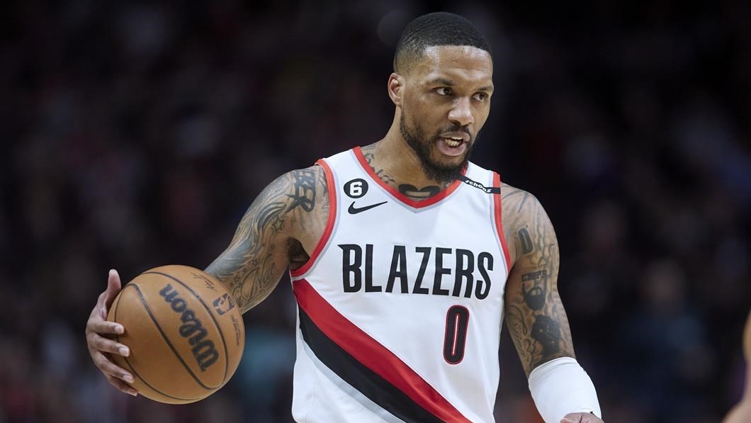 All-Star point guard Damian Lillard was traded to the Bucks as part of a three-team transaction, according to the report.